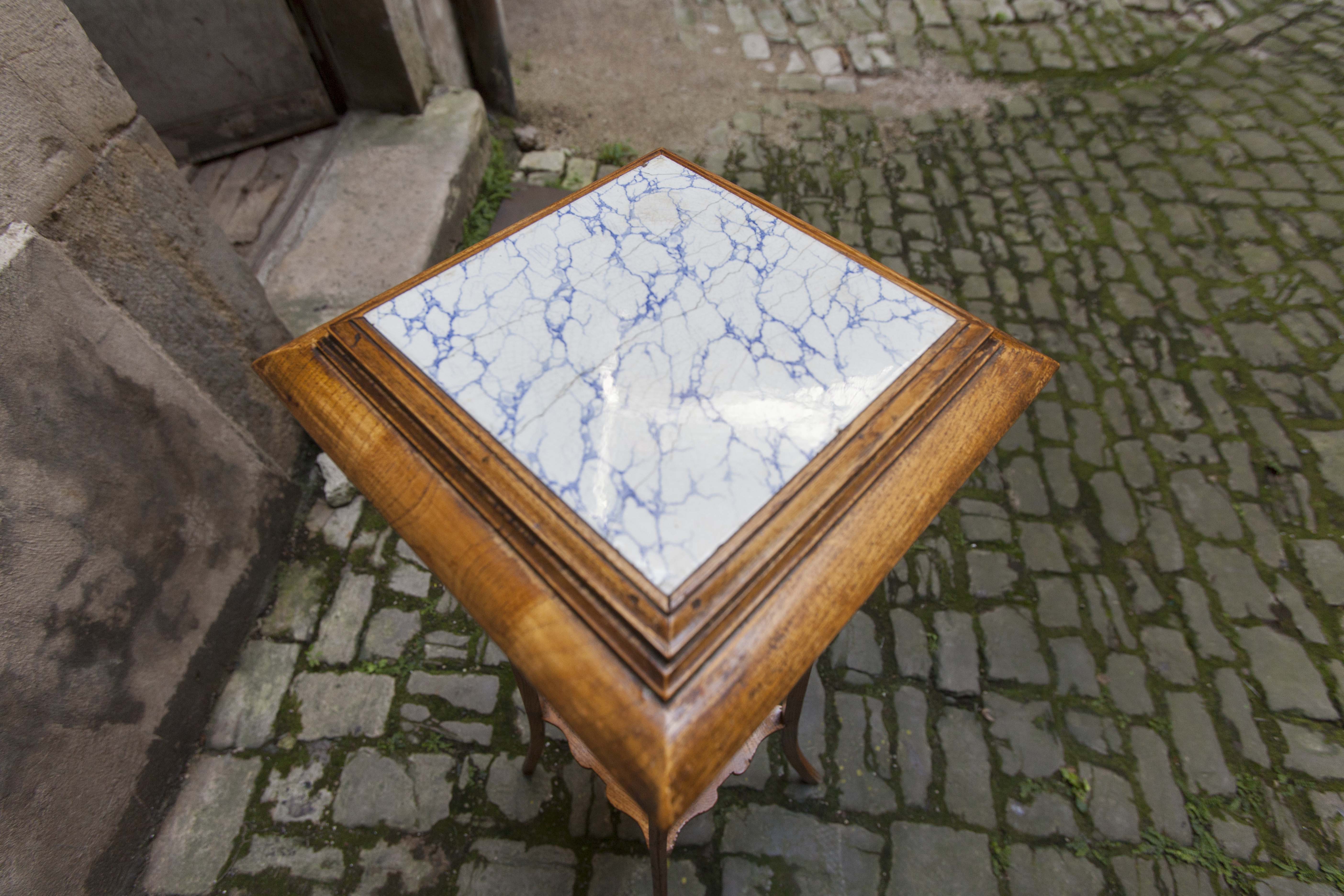 Wooden and ceramic sellette, 1920