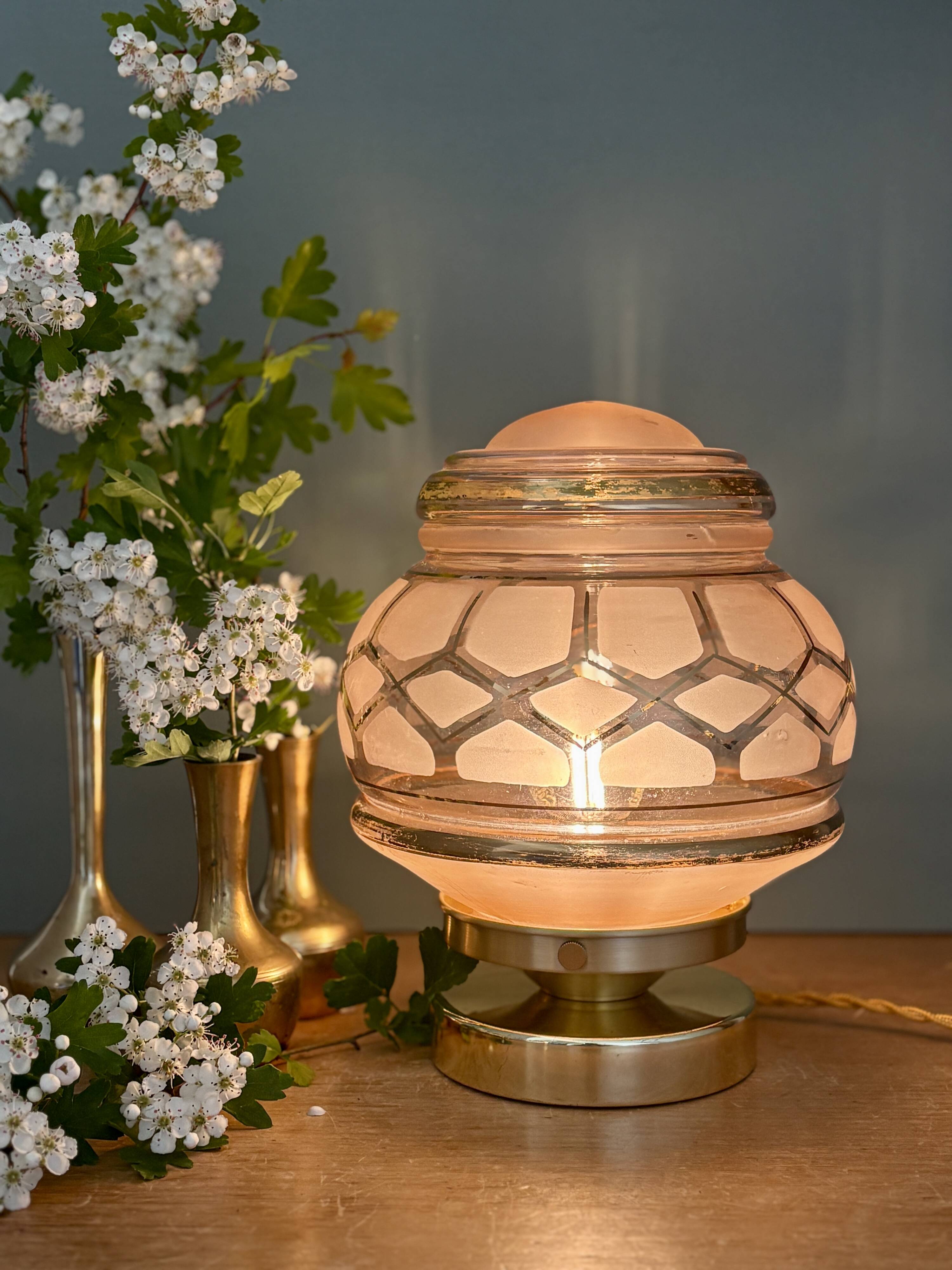 Vintage Art Deco globe table lamp in pink and gold glass.