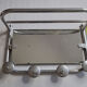 Portemanteau mural en aluminium avec miroir orientable, 4 patères et un porte chapeau, années 50