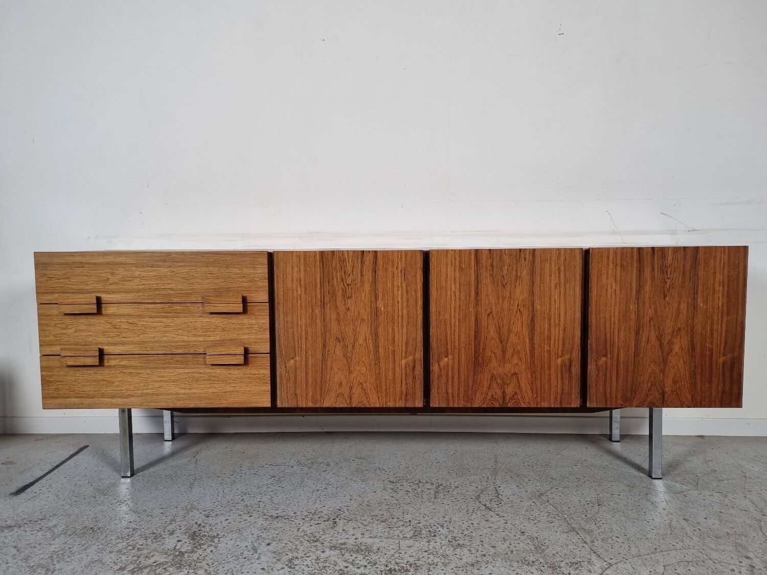 Scandinavian row in rosewood and chrome, 60s