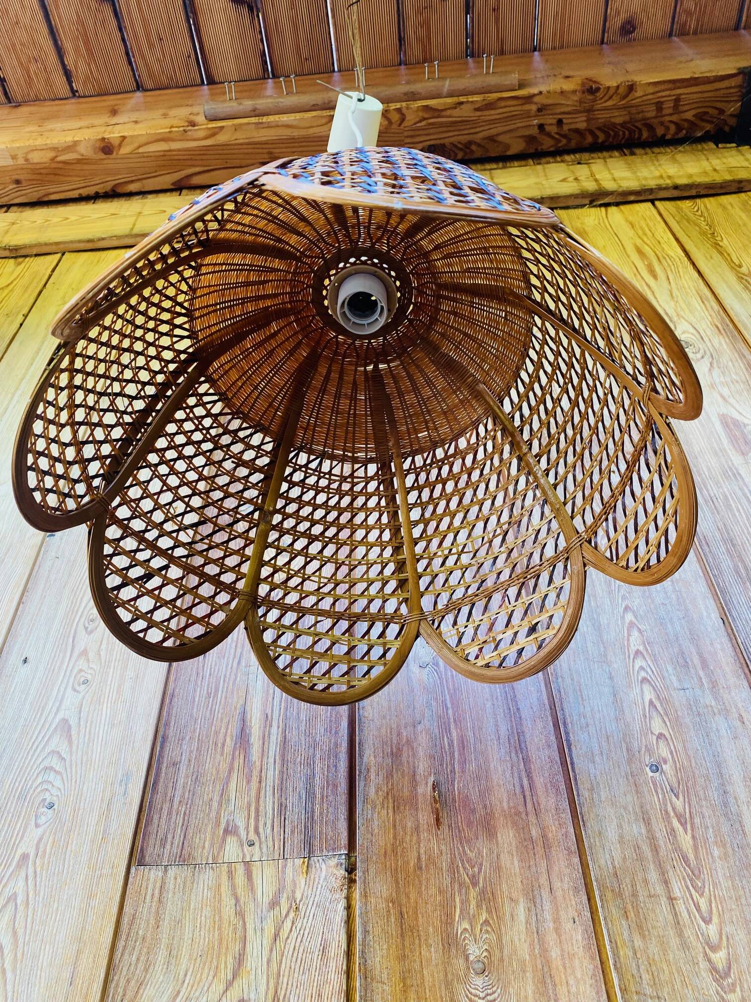 Rattan and cane lampshade in the shape of a flower from the 1970s.