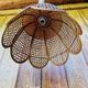 Rattan and cane lampshade in the shape of a flower from the 1970s.