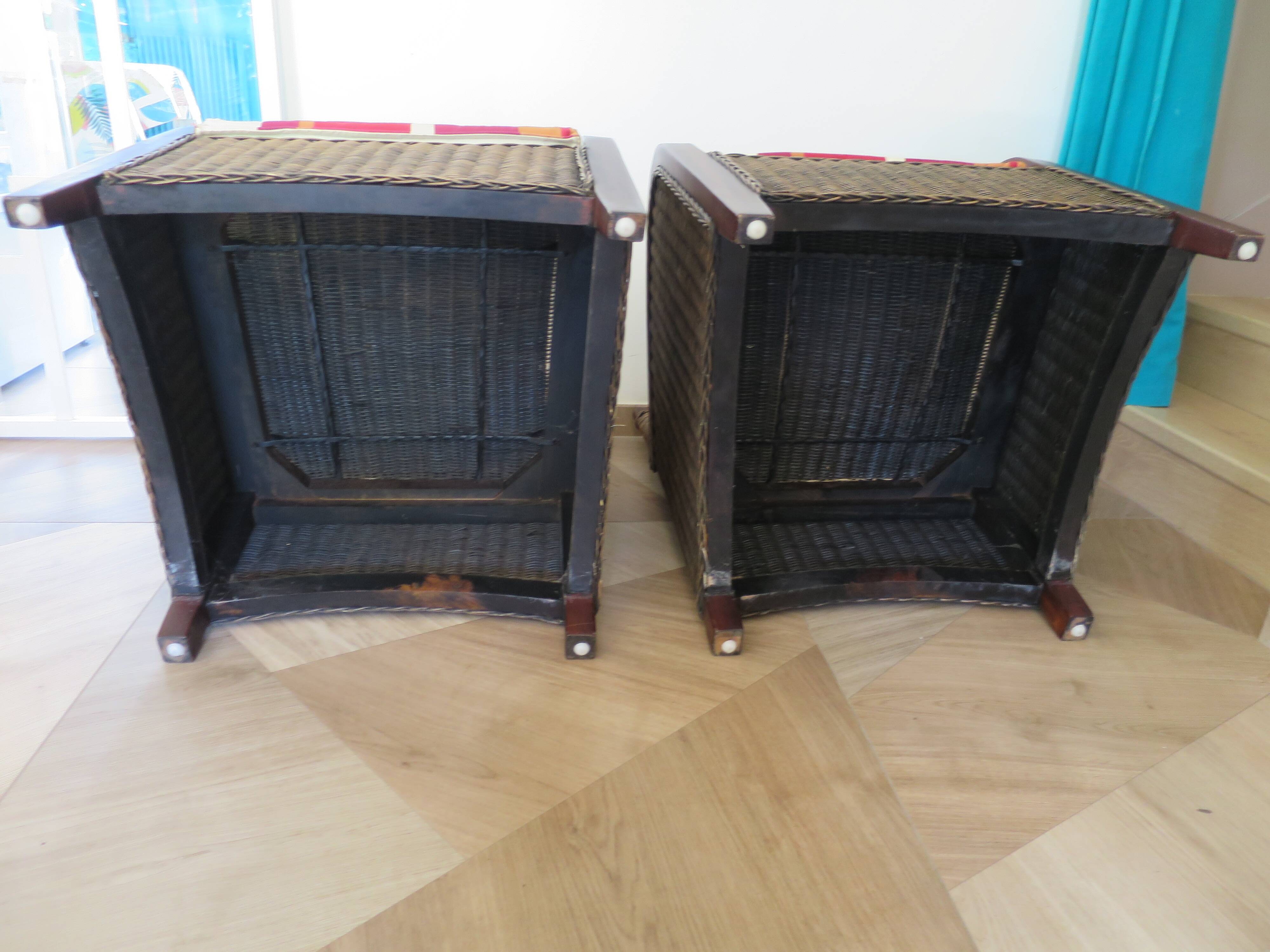 2 armchairs in woven rattan and wood, 1980s
