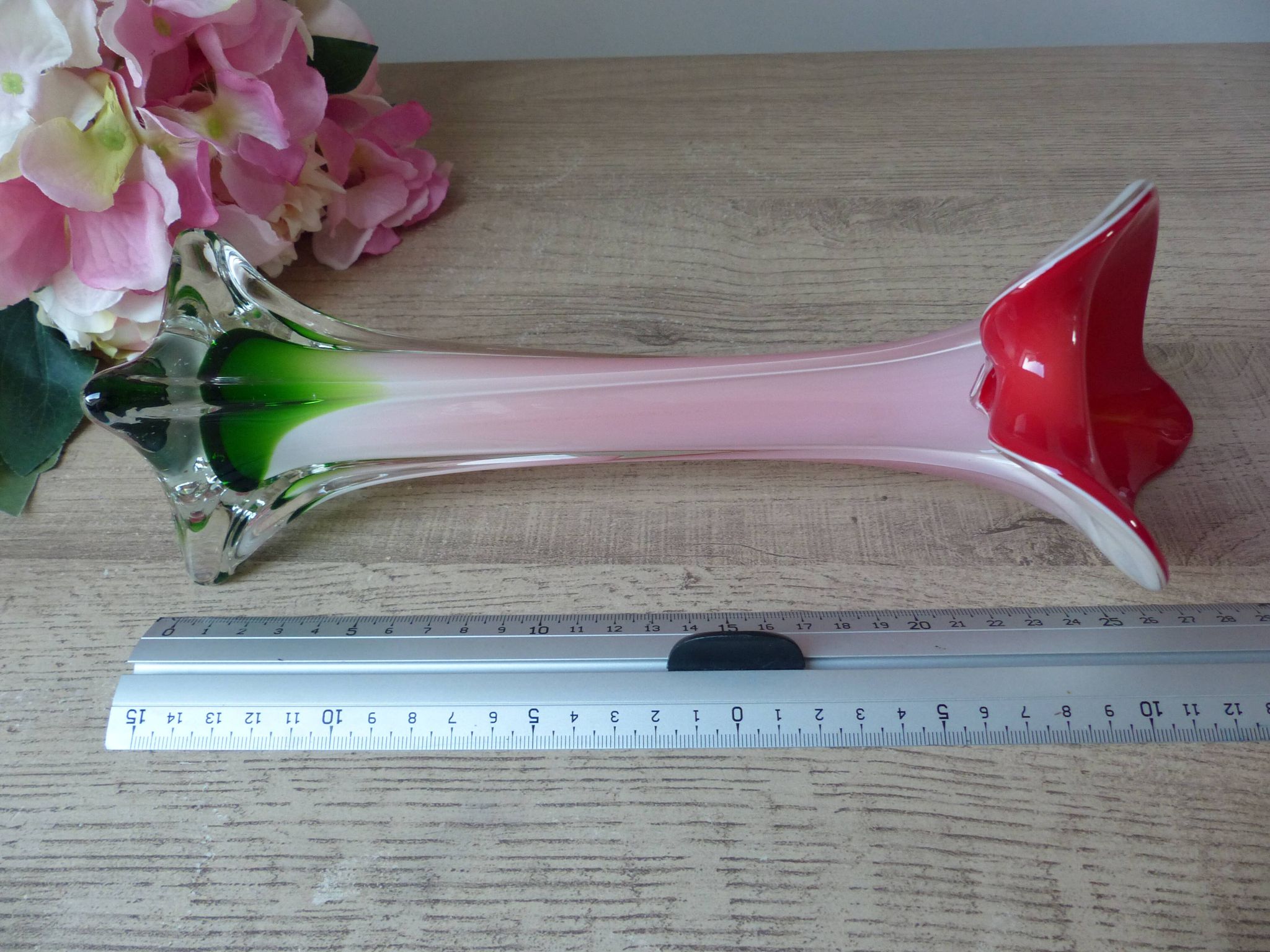 Vintage coloured blown glass vase in the shape of a calla lily.