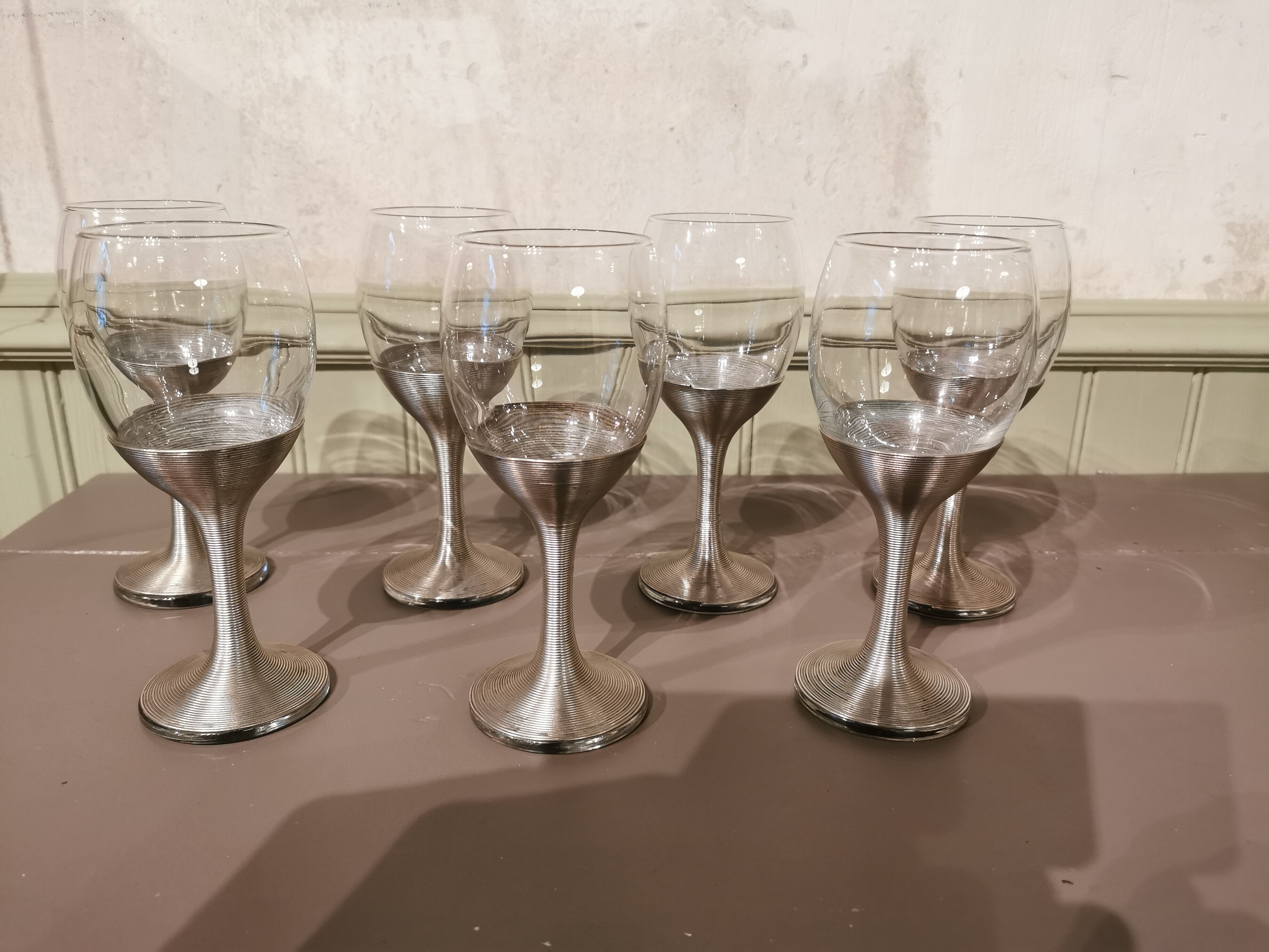 Suite de 7 verres à pied en Maillechort