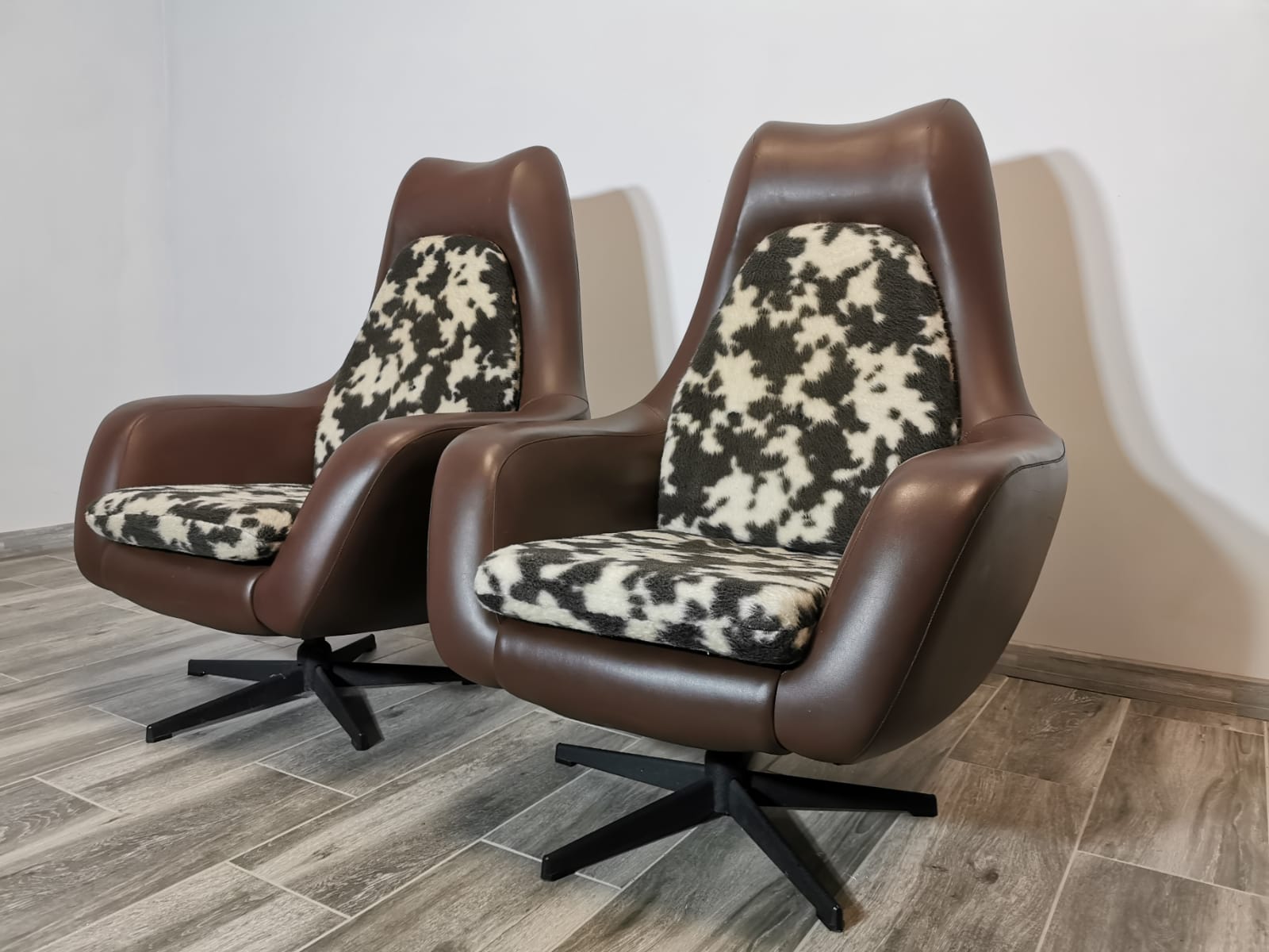 Mid century swivel armchairs