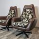 Mid century swivel armchairs