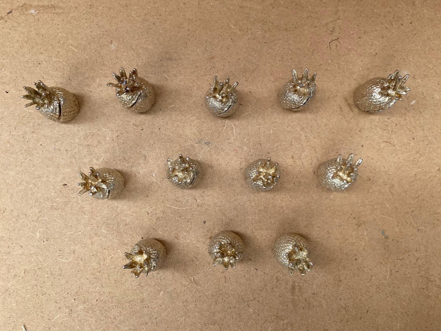 Set of 12 vintage gold metal pineapple shaped table place markers