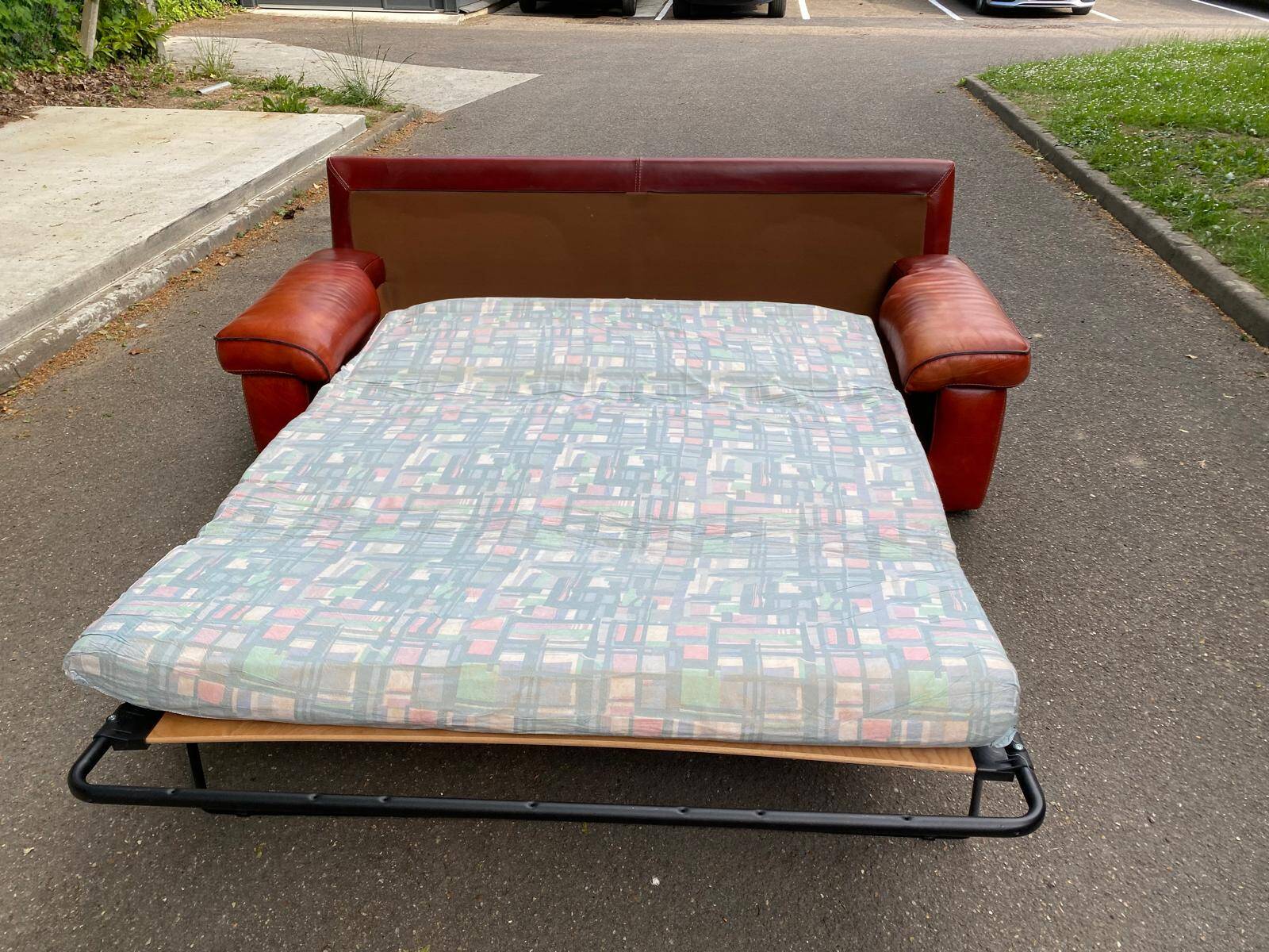 3-seater burgundy leather sofa convertible into a 2-seater bed 1940