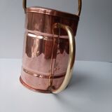 Ancient copper watering can