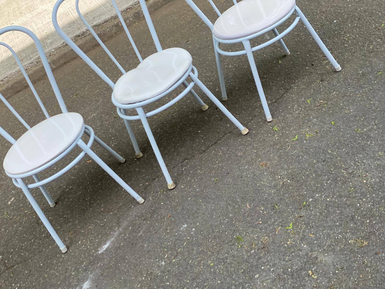 3 white steel and beige leather bistro chairs