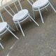 3 white steel and beige leather bistro chairs