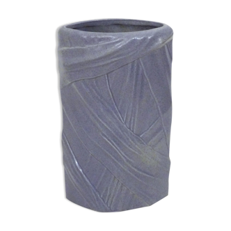 Purple vase, draped ribbons in relief