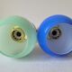 Duo of porcelain and opaline wall lamps