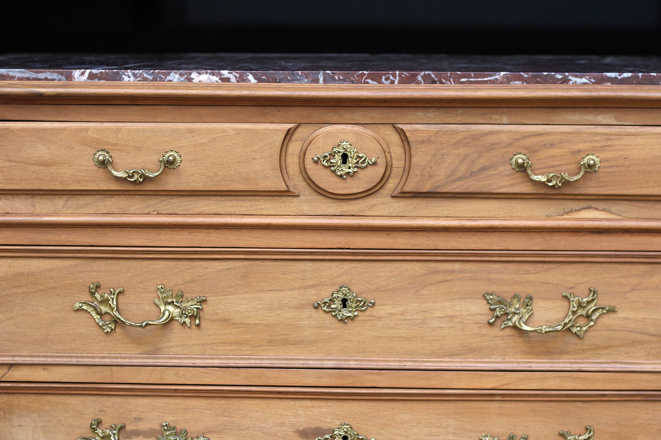 walnut chest of drawers by L. GENIN (Marseille). Circa 1900.