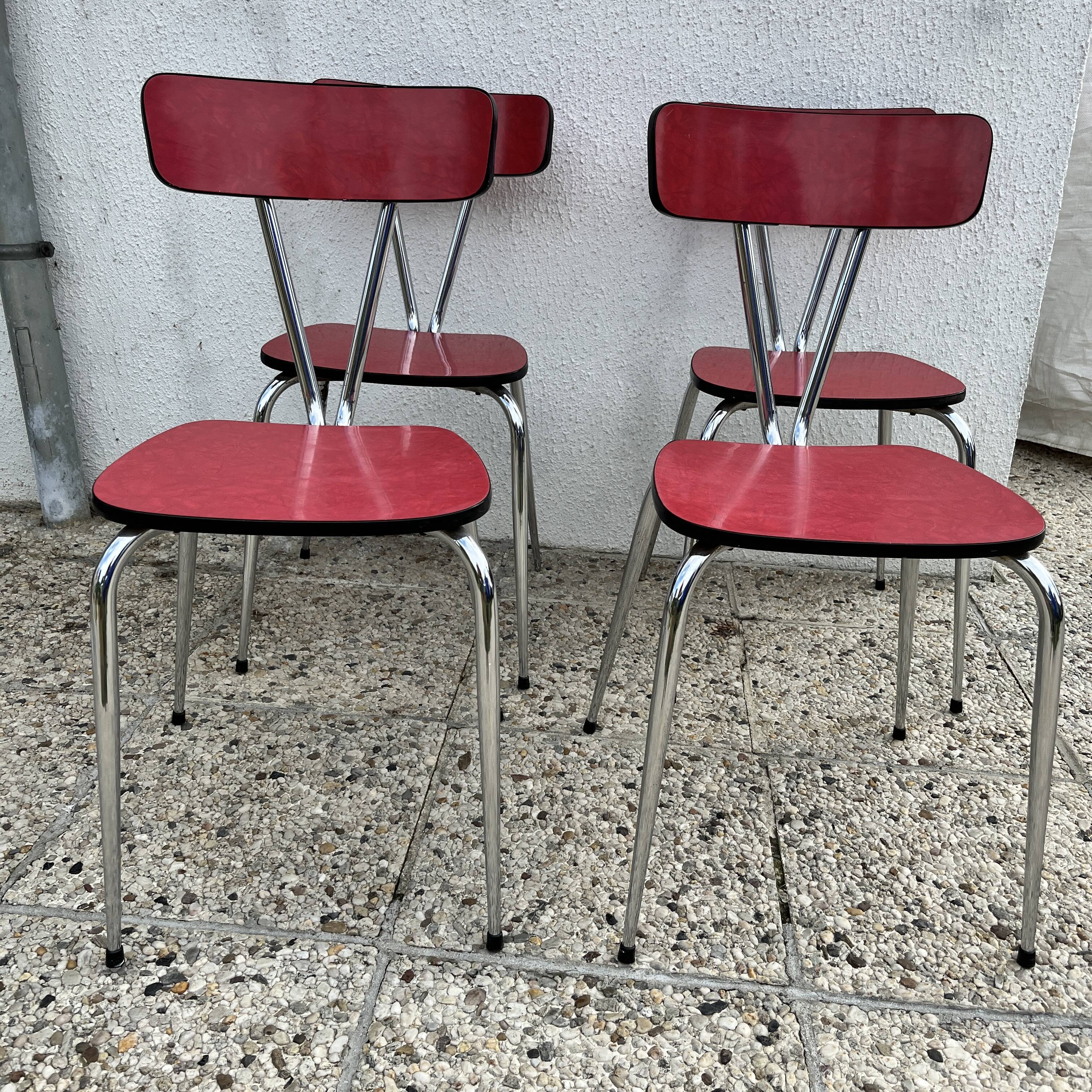 Chairs in formica red foot compass
