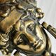 Large antique style brass metal knocker.