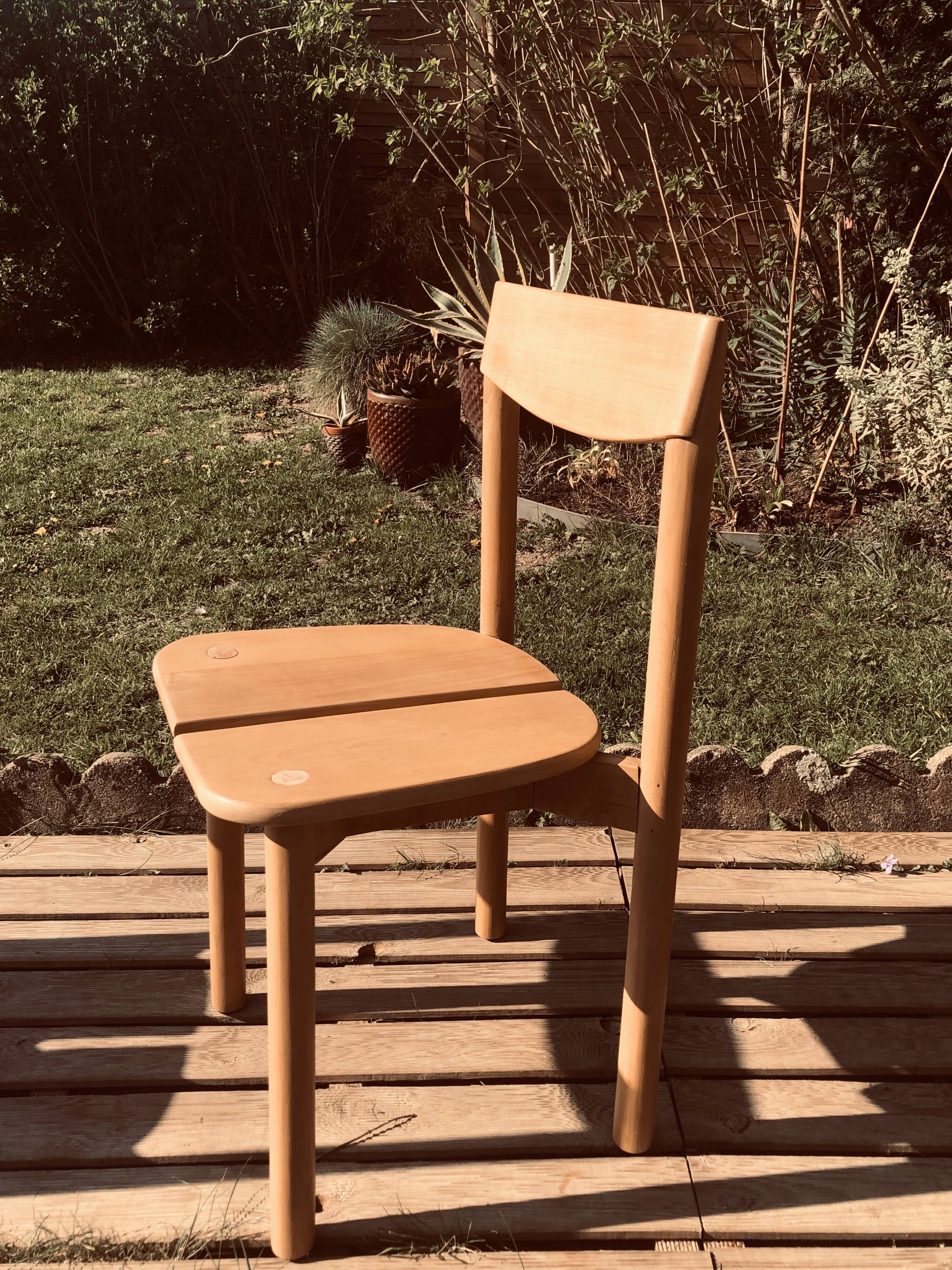 Pair of solid wood chairs P.G. DELAYE "Coffee Grain"