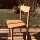 Paire de chaises bois massif P.G. Delaye “Grain de café”