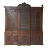 Glass-fronted walnut bookcase
