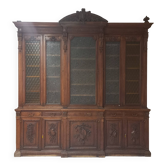 Glass-fronted walnut bookcase