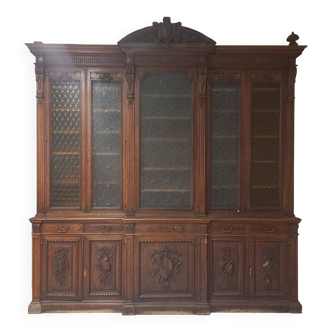 Glass-fronted walnut bookcase