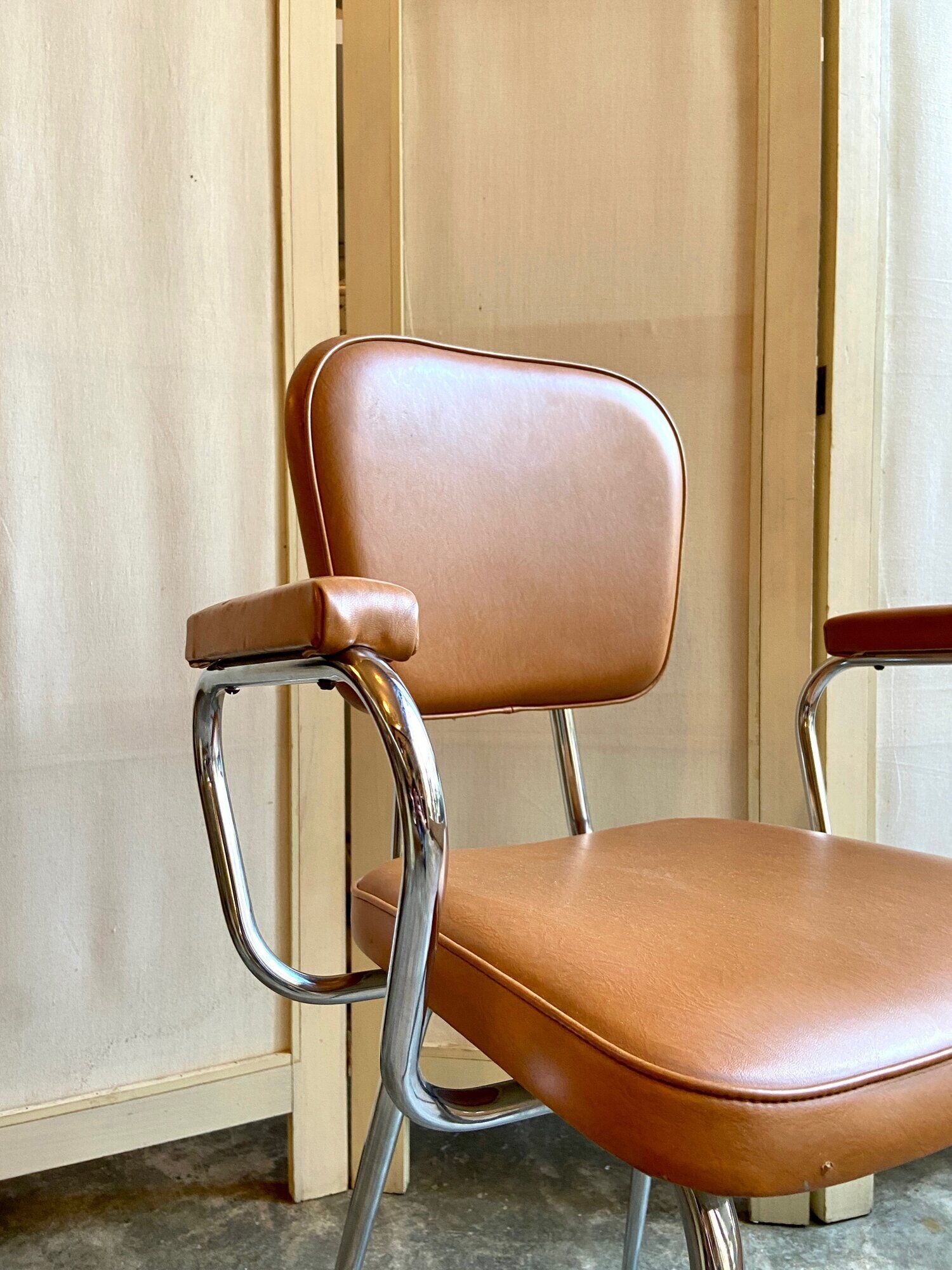 Armchair in chromed metal and tawny skaï 1950s