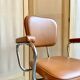 Armchair in chromed metal and tawny skaï 1950s