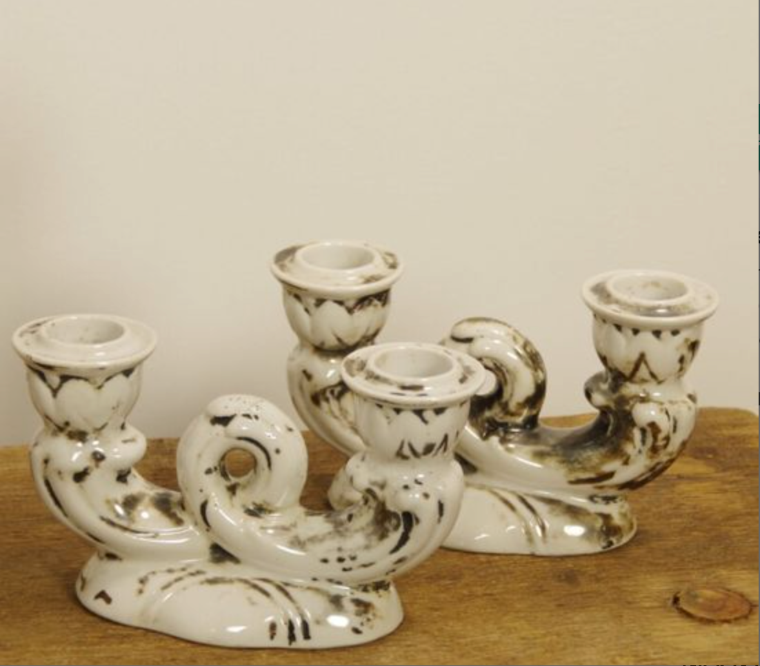 Set of two antique porcelain candle holders