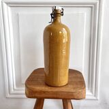 Bouteille ancienne en grès vernissé et bouchon en faÏence