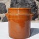 Trio of stoneware pots with lids