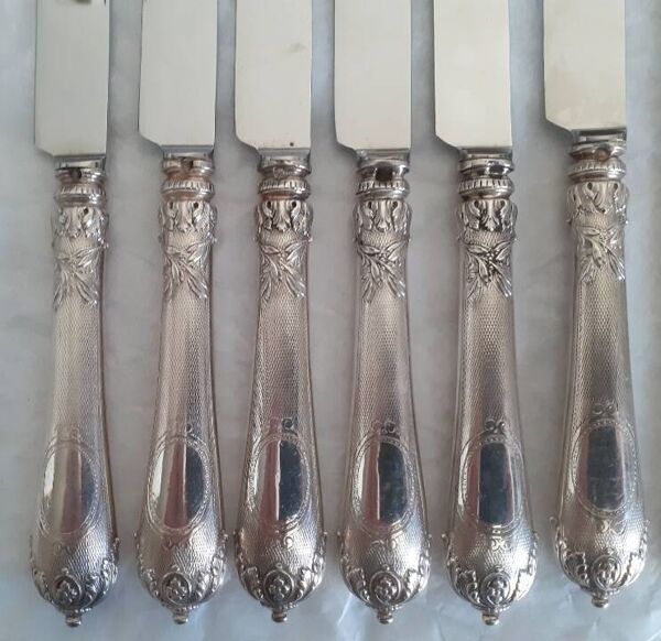 12 couteaux manche en argent fourré