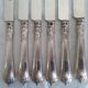 12 knives with silver-plated handles