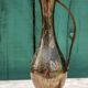 Carafe vase in chiseled brass