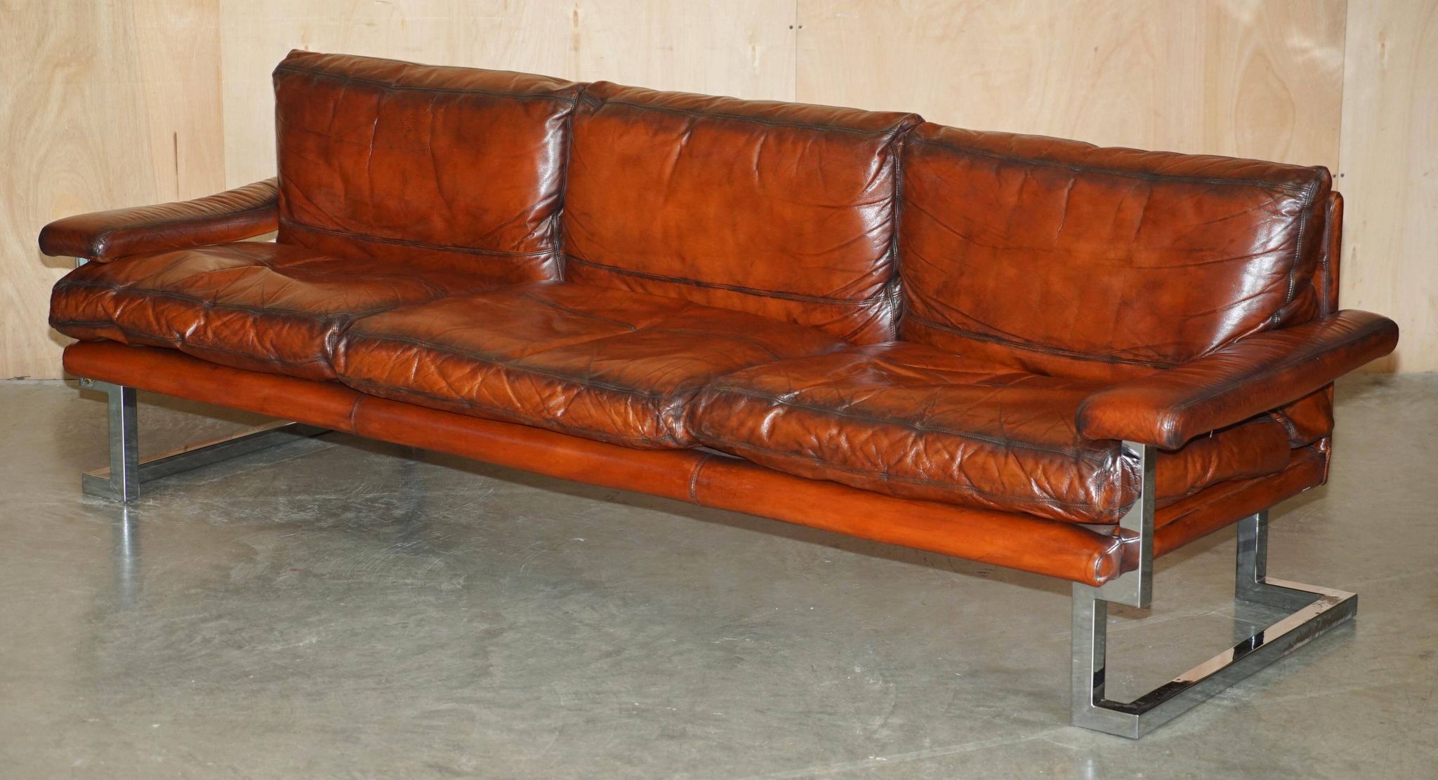 Restored suite Tim Bates for Pieff Mandarin leather chrome hardwood.