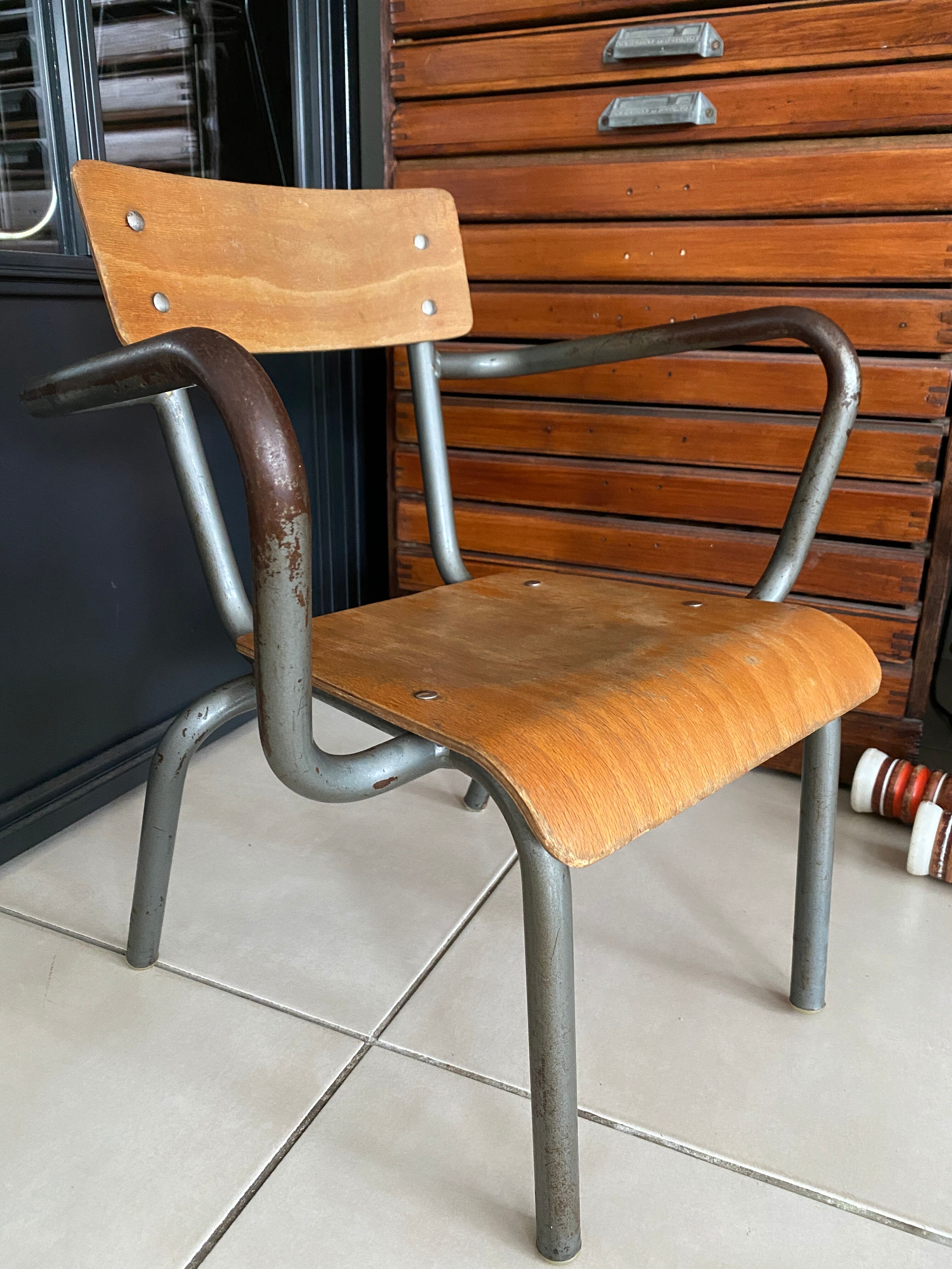 Old Mullca school chair with armrests