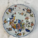 Flat plate in earthenware with polychrome decoration in Rouen style