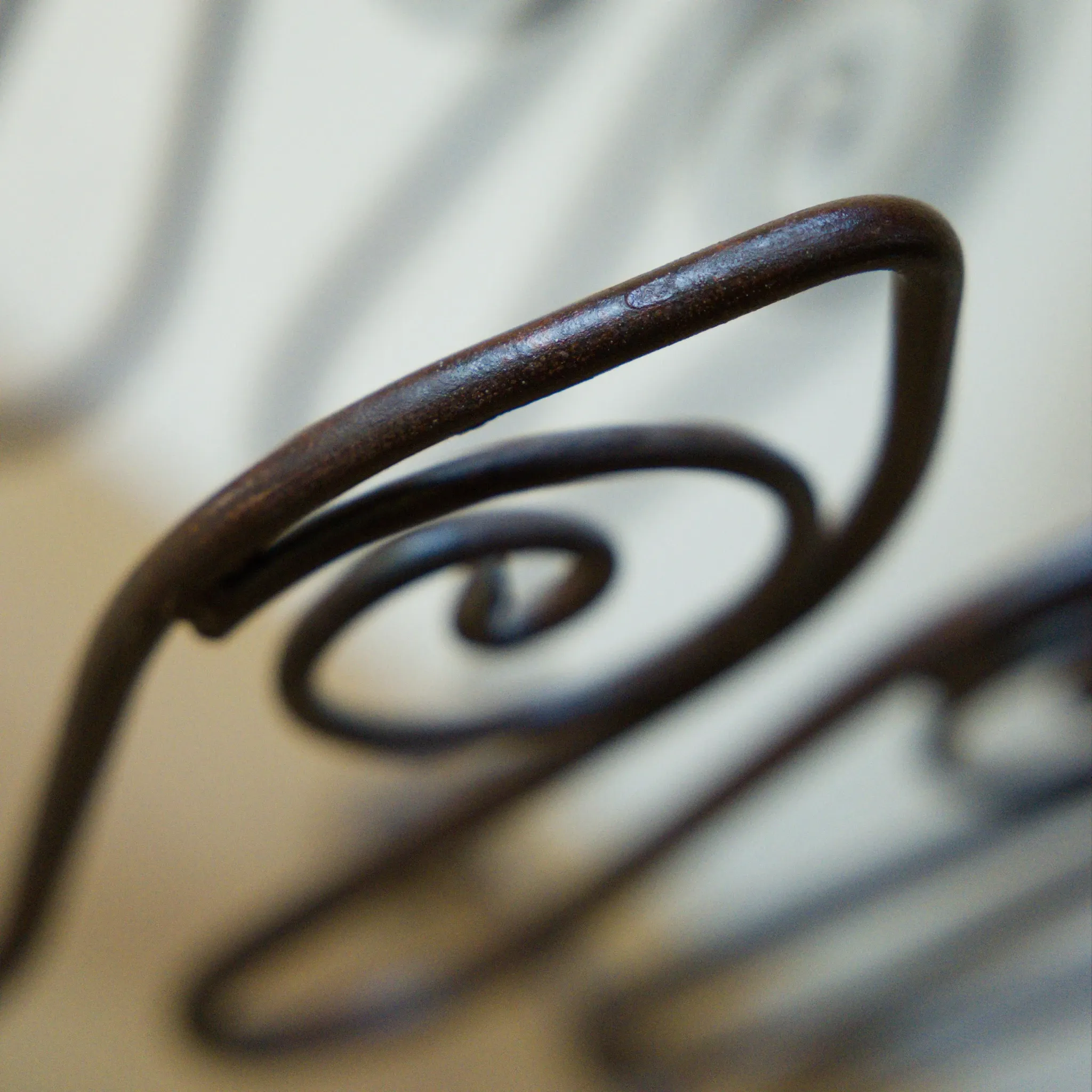 Wrought iron magazine rack, François Liguori for Studio Pescatore