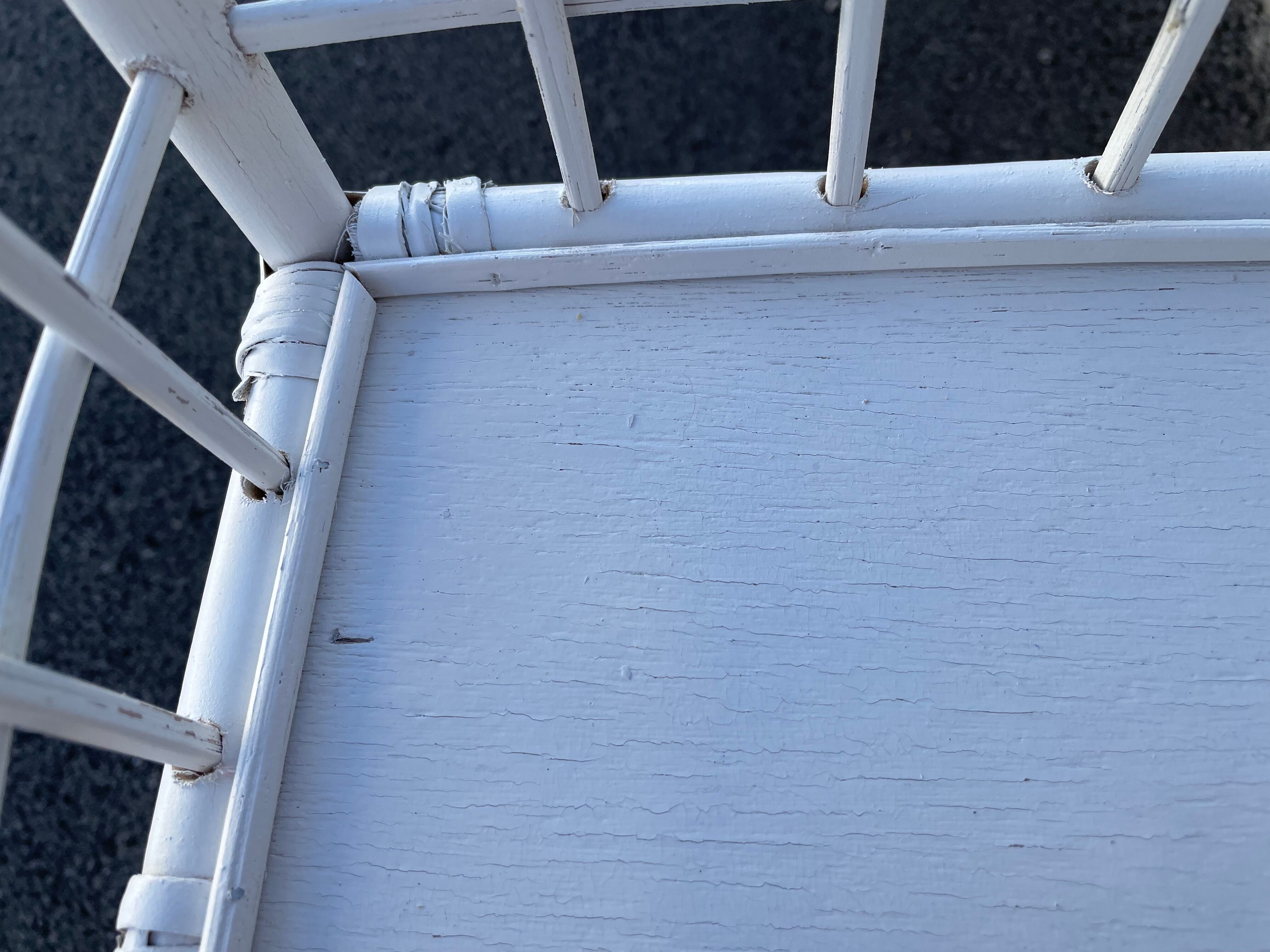 White rattan shelf with braces