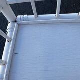 White rattan shelf with braces