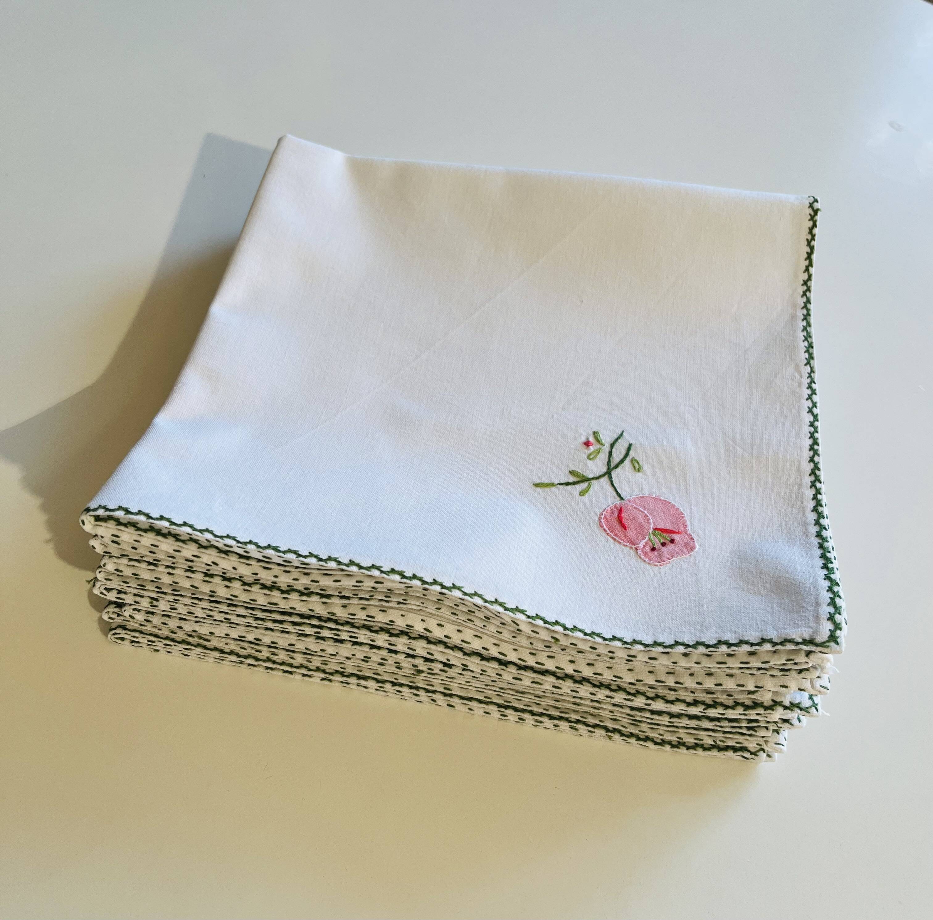 Set of 12 vintage hand-embroidered cotton white napkins.