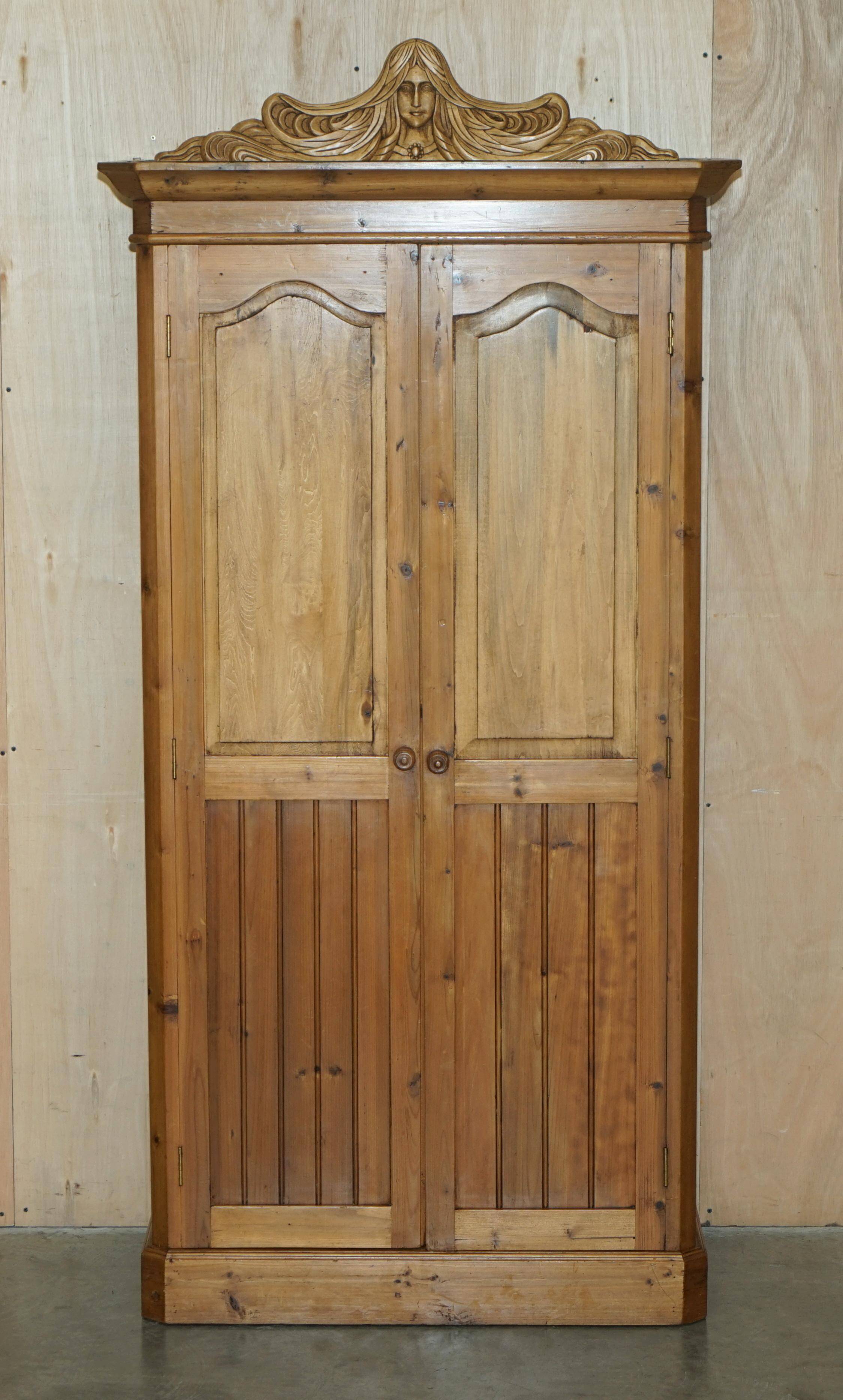 Vintage hand-carved wardrobe in Art Nouveau style.