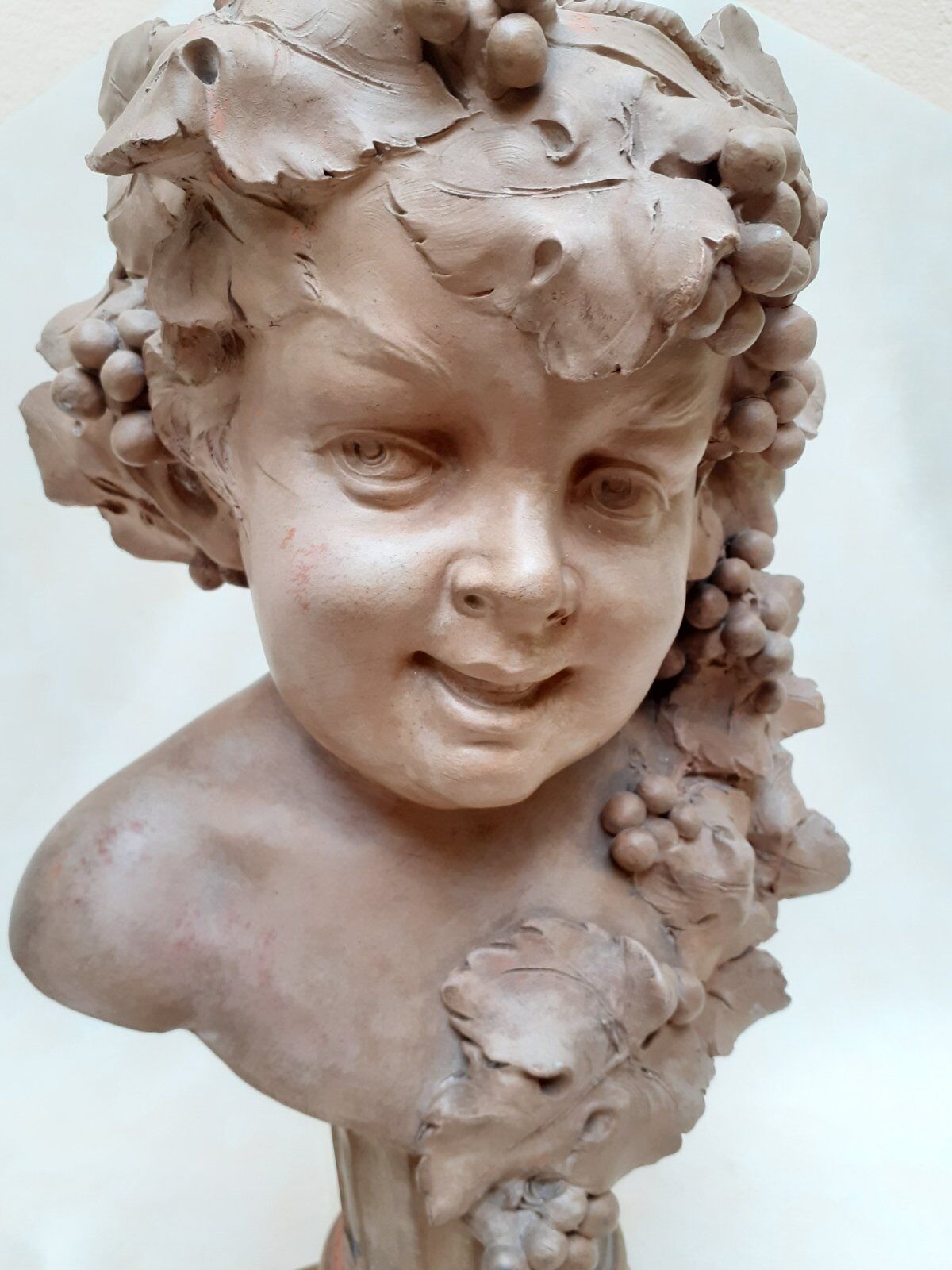 Buste de Bacchus enfant en terre cuite
