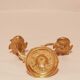 Old candle holder in gilded bronze