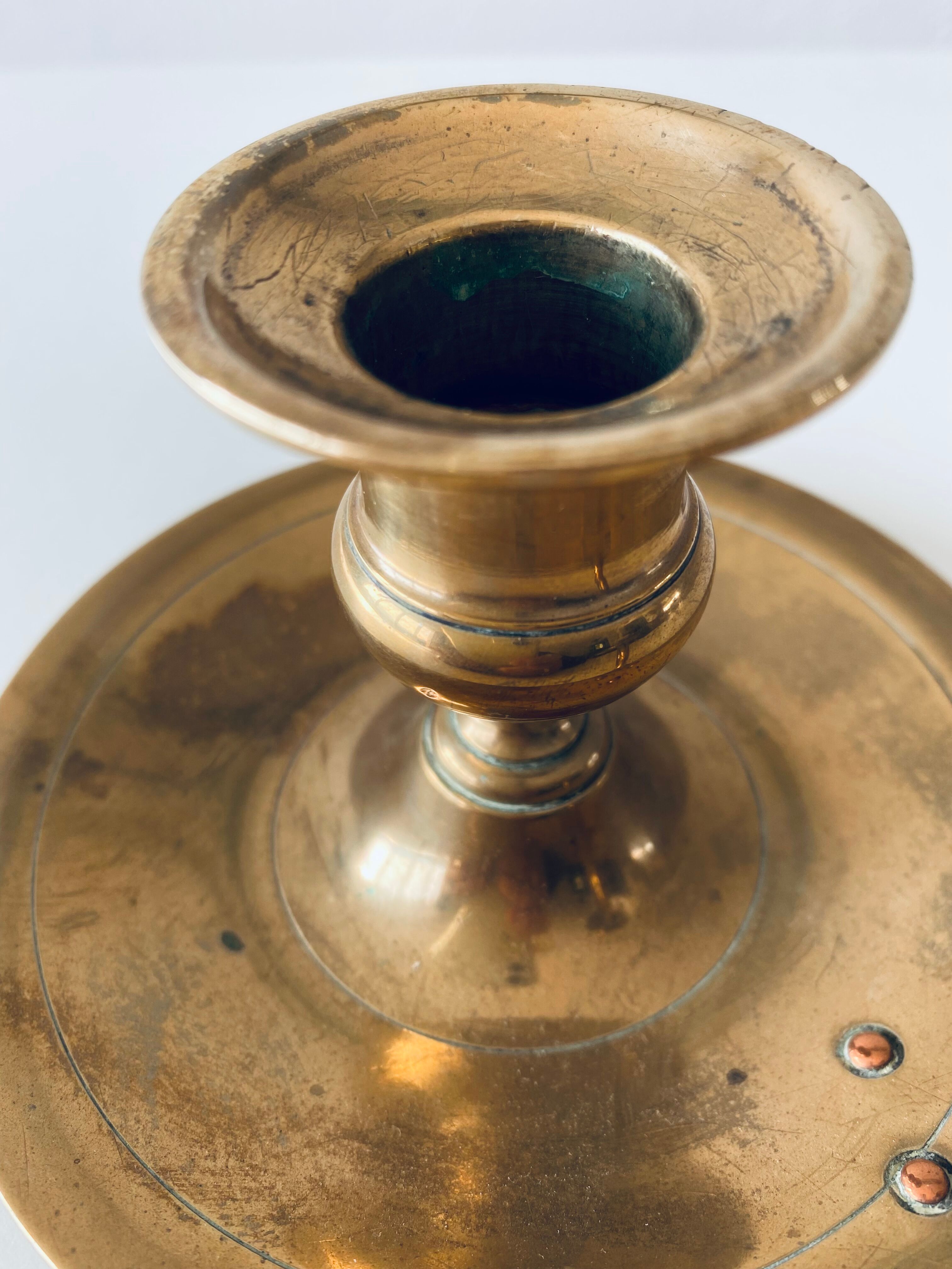 Old candle holder with handle