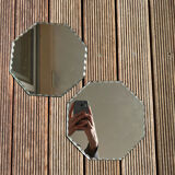 Pair of beveled octagonal mirrors