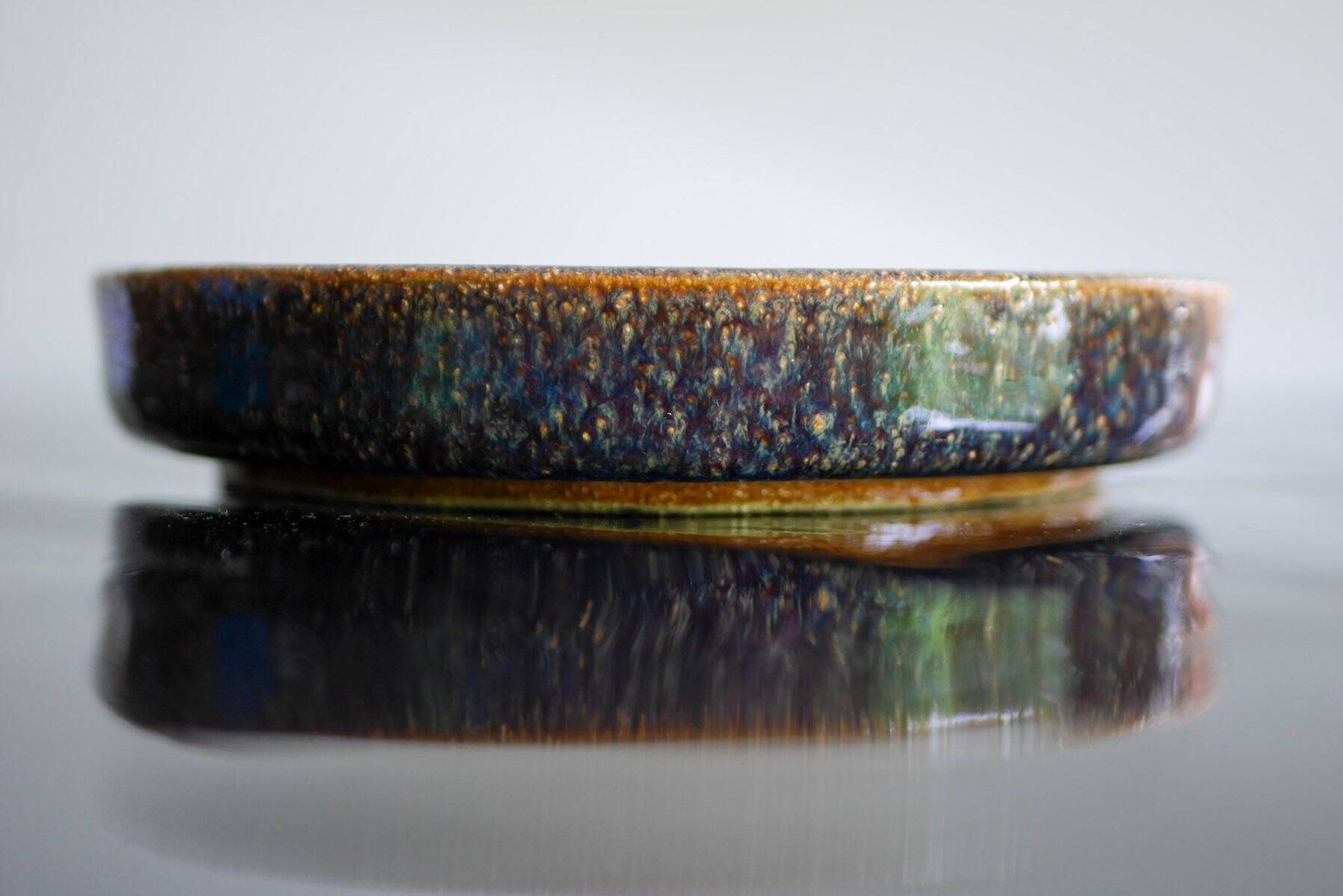 Ceramic plate in modernist art by Michael Andersen, Denmark, 1960s.