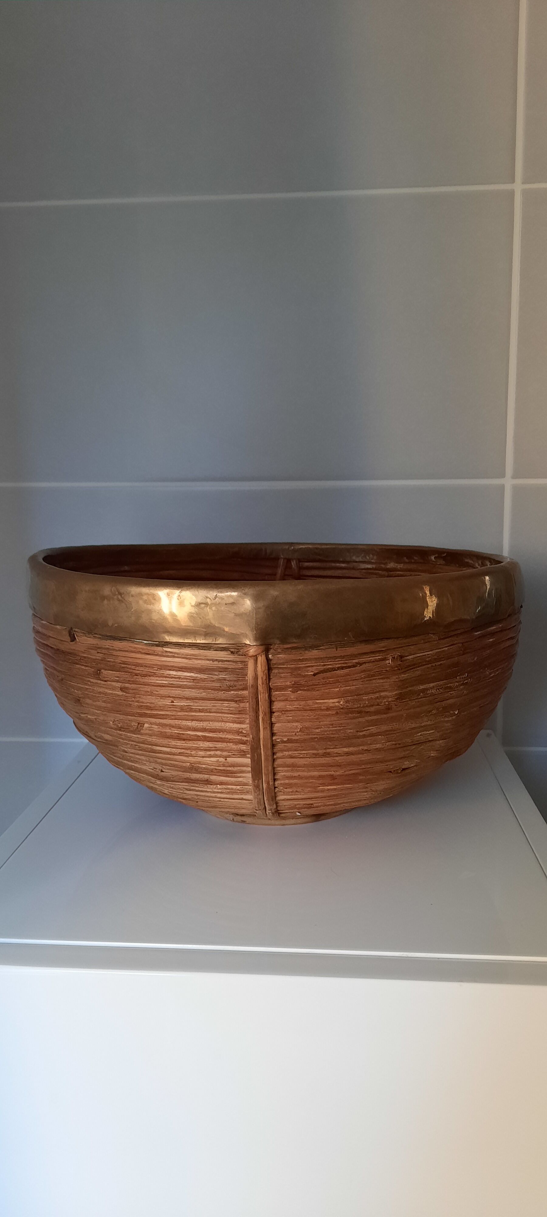 Rattan and brass basket