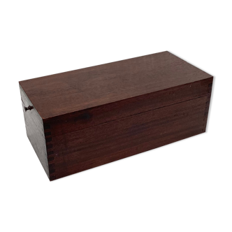 Wooden plug box with brass closure