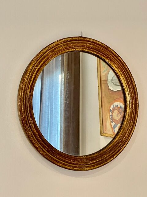 Old mirror in gilded wood early twentieth century